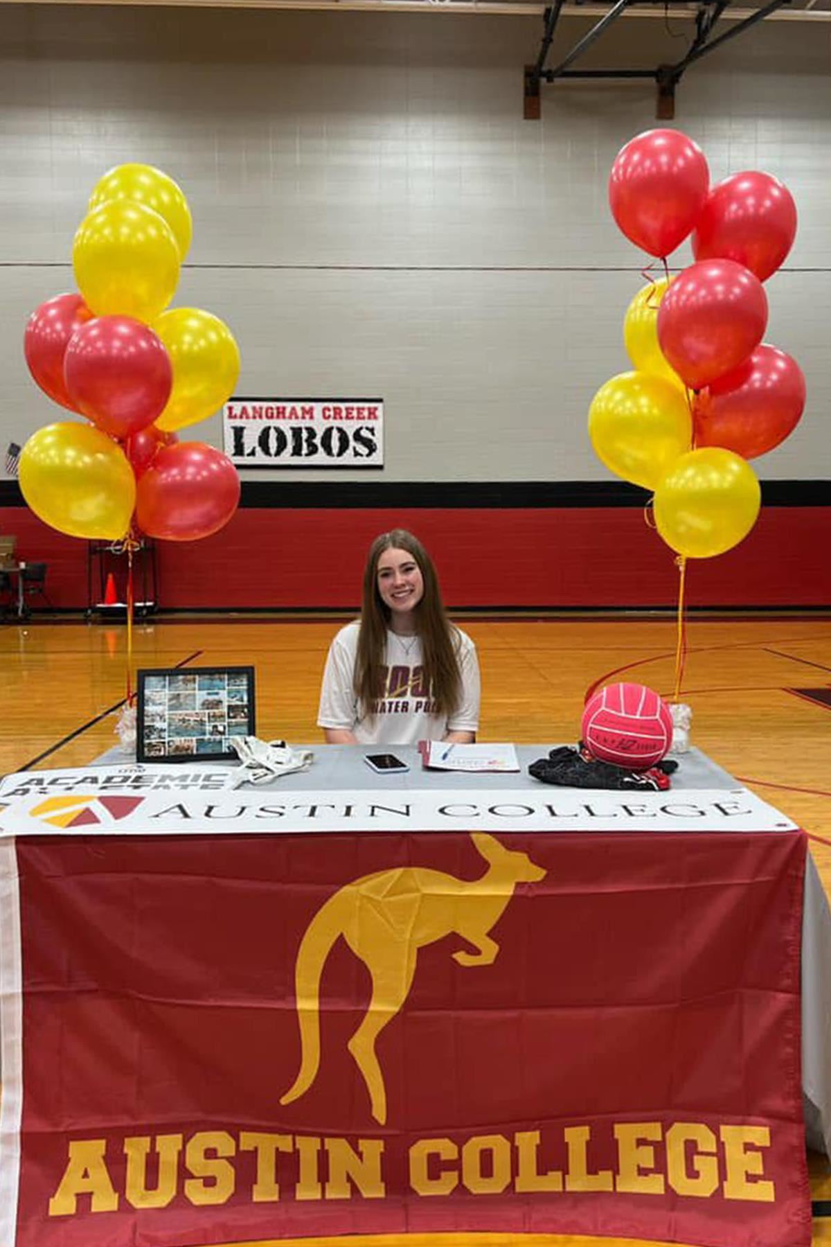 Langham Creek High School senior Morgan Evans signed a letter of intent to play water polo at Austin College.